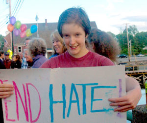 15-year-old old Lydia LaPado participated in her first vigil, calling for an end to hate. (Eleanor Cade Busby photo)