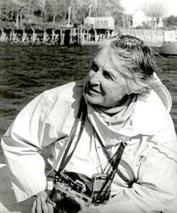 Documentary photographer Olive Pierce in 1995, in a boat off the Maine coast. (Photo courtesy Laurence Pierce)