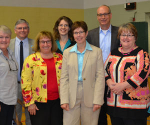 Local, state, and federal representatives attend an informal meeting with U.S. Department of Energy officials in Wiscasset on Friday, June 3. Back from left: state Sen. Chris Johnson and Department of Energy representatives Melissa Bates and Andrew Griffith. Front from left: Selectman Judy Colby; Marge Kilkelly, senior policy adviser to U.S. Sen. Angus King; Pam Trinward, field representative for U.S. Congresswoman Chellie Pingree; Patricia Aho, state representative for U.S. Sen. Susan Collins; Town Manager Marian Anderson; and Selectman Judy Flanagan. (Abigail Adams photo)