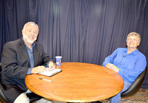 Steve Raymond and Beth Parks prepare to tape an episode of “Spotlight on Seniors” at the Lincoln County Television studio in Newcastle on June 28. (Christine LaPado-Breglia photo)