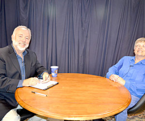 Steve Raymond and Beth Parks prepare to tape an episode of “Spotlight on Seniors” at the Lincoln County Television studio in Newcastle on June 28. (Christine LaPado-Breglia photo)