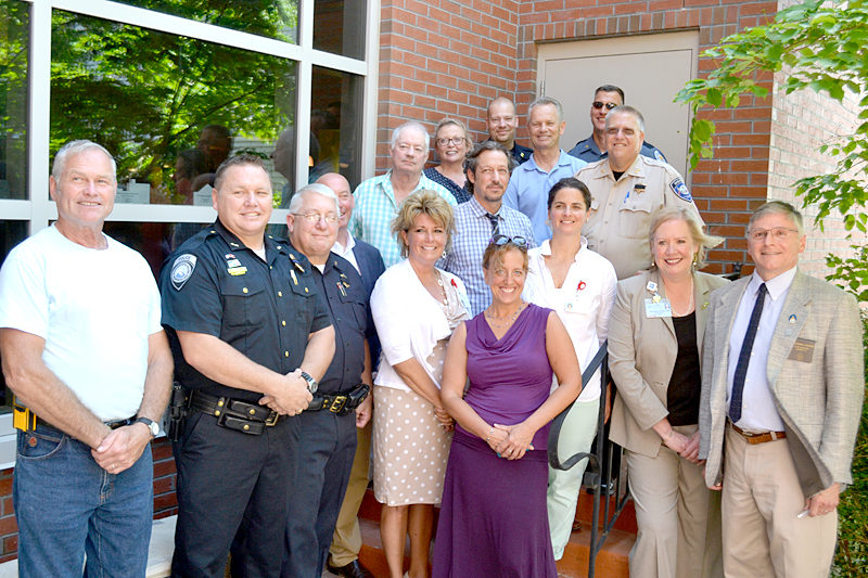 Officials from every law enforcement agency in Lincoln County, as well as LincolnHealth, the Mid Coast Hospital Addiction Resource Center, and the CLC YMCA, gathered to sign a memorandum of understanding in Damariscotta on Friday, July 15. The ceremony officially launched the Lincoln County Recovery Collaborative, an outreach and treatment program for heroin and opioid addicts. (Abigail Adams photo)