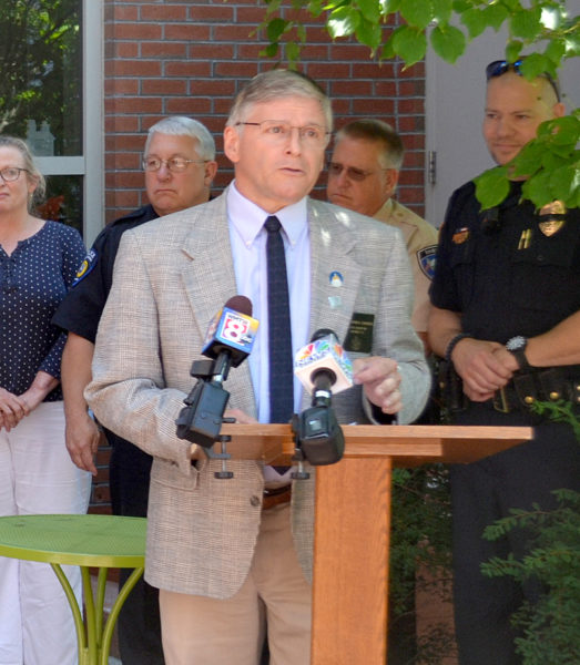 State Sen. Chris Johnson introduces the Lincoln County Recovery Collaborative, a program to connect heroin and opioid addicts to treatment resources without the threat of incarceration, during a ceremony in the courtyard of the Skidompha Public Library on Friday, July 15. (Abigail Adams photo)