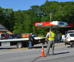 A tow truck from Hillside Collision Center prepares to remove a Toyota RAV4 from the road after a two-car accident on Route 1 in Newcastle the afternoon of Tuesday, July 5. (Maia Zewert photo)