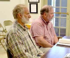 The Power Co. representative Richard Simon (left) and Coastal Enterprises Inc. representative John Egan appear before the Wiscasset Planning Board on Monday, July 11. The board approved CEI's application to install six additional solar panels at its Deer Ridge Apartments in Wiscasset. (Charlotte Boynton photo)