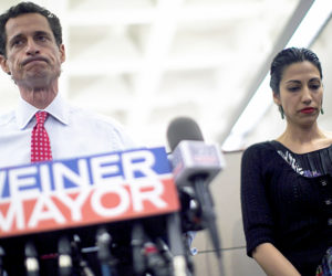 Anthony Weiner and Huma Abedin at a 2013 news conference.