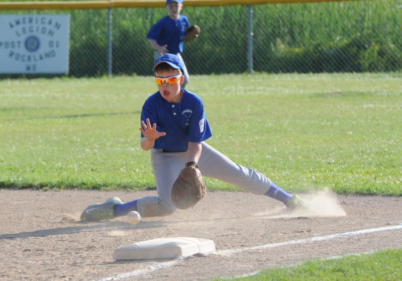 Gabe Hagar scoops up a ground ball at first base. (Paula Roberts photo)
