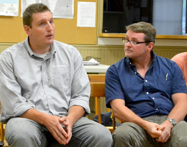 Wright-Pierce engineer Joe McLean (left) speaks during a Wednesday, Aug. 24 meeting about the Bristol Mills Dam as Bristol Fish Committee member Slade Moore looks on. (Maia Zewert photo)