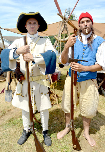 "French sailors" Mario Lacelle (left) and Neil Hamilton protect their supplies before their 1696 siege of Fort William Henry in Pemaquid. (Haley Bascom photo)