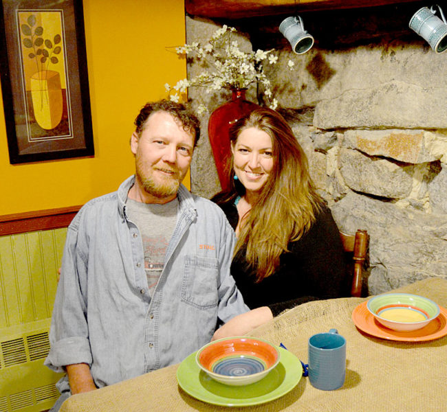Alex Brown and Christine Schweighauser sit at a table in Cocinas Underground in May. The "cultural fusion" restaurant opened Thursday, Aug. 4. (Maia Zewert photo, LCN file)