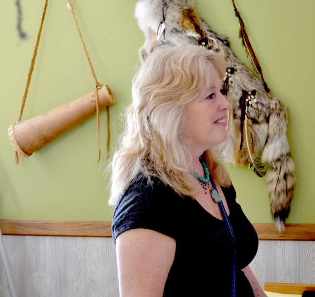 Jocelyn Howe works at Abenaki Trading Co. in its new location in Edgecomb on Tuesday, Aug. 9. The store is raising awareness of Native American cultures and traditions through the sale of authentic products handcrafted by native artisans. (Abigail Adams photo)