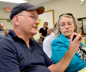 John Tibbetts addresses representatives from the Maine Department of Transportation about the Sherman Marsh Wetland Bank project as Martha Gaythwaite looks on during a meeting at the Newcastle fire station Wednesday, Aug. 17. (Maia Zewert photo)
