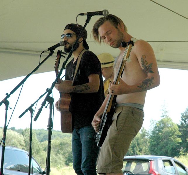 Jackson Howard (right) plays bass guitar while Thomas Signoretti handles the vocals for the band Hours North. (Alexander Violo photo)