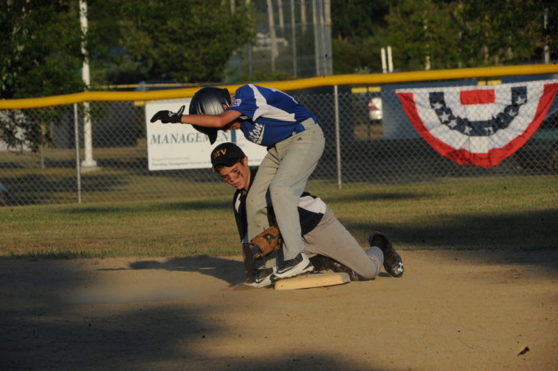 Isaac Staples applies the late tag to Lewiston's Bazton St. Hillaire.