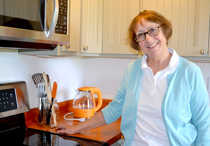 Amy Kefauver stands in the kitchen of her Bristol Road rental apartment, where she will host the upcoming food-writers workshop featuring prominent New York editor Holly Hughes and cookbook author Kathy Gunst. Kefauver will prepare a communal lunch for workshop attendees, featuring a soup created from a recipe in Gunst's brand-new cookbook, "Soup Swap." (Christine LaPado-Breglia photo)