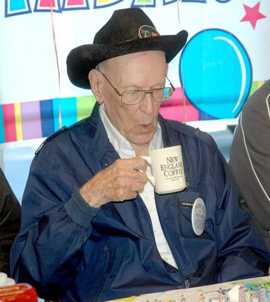 Woody Verge, of Waldoboro, enjoys a cup of coffee during his 100th birthday breakfast at Moody's Diner. (Alexander Violo photo)