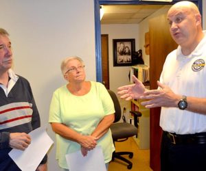 From left: Wiscasset Selectmen Ben Rines and Judy Colby listen as Wiscasset Ambulance Service Director Toby Martin explains the department's needs during the selectmen's tour of the department Monday, Sept. 12. (Abigail Adams photo)