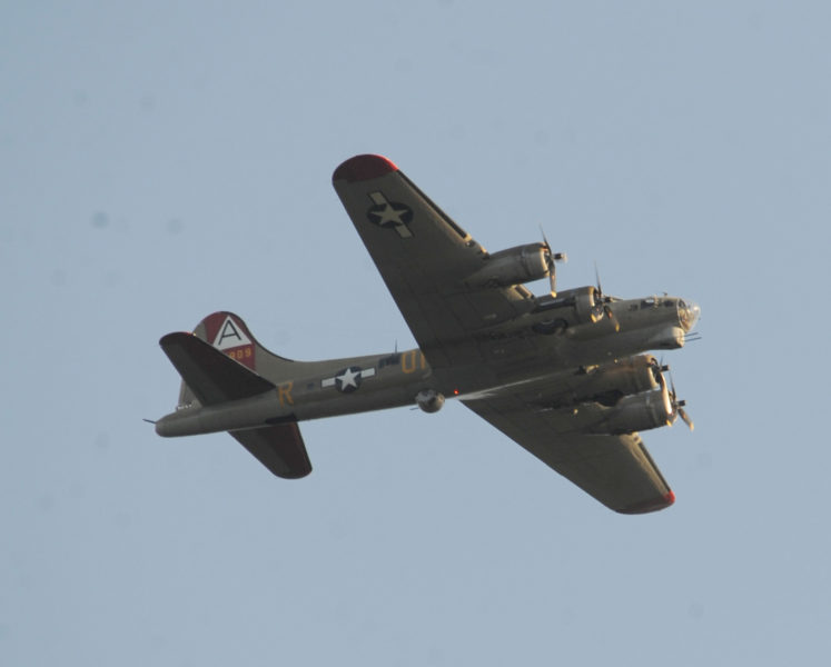 A World War II-era B-17 Flying Fortress bomber flies low over Wawenock Golf Course in Walpole on Thursday, Sept. 22. (Paula Roberts photo)