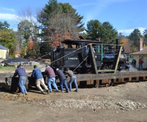 Wiscasset, Waterville & Farmington Railway Museum volunteers push Engine No. 9 on the museum's turntable Saturday, Oct. 15. (Abigail Adams photo)