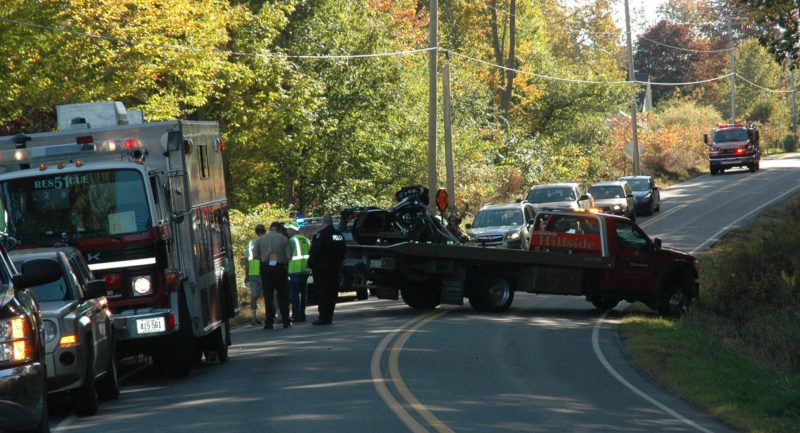 A tow truck prepares to haul away a motorcycle after an accident on Route 32 in Bremen the afternoon of Friday, Oct. 7. (Alexander Violo photo)