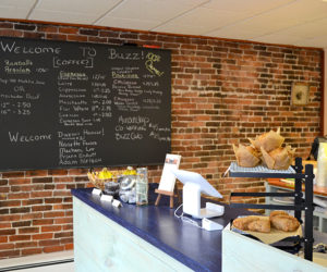 Buzz Maine, at 133 Main St. in Damariscotta, features a grab-and-go organic coffee bar with baked goods and sandwiches, open to both members and the general public. The family business offers "a 21st-century take on the workday," according to co-owner Jennifer Van Horne, and also features a workspace for members and a cocktail hour. (Maia Zewert photo)