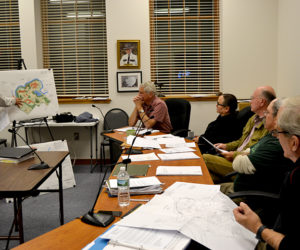 Peter Biegel, a landscape architect with Land Design Solutions, presents the plan for LincolnHealth's outpatient health center to the Damariscotta Planning Board and Town Planner Tony Dater on Monday, Oct. 3. LincolnHealth plans to build the 2 1/2-story building between between the hospital and Schooner Cove. (Maia Zewert photo)