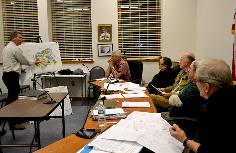 Peter Biegel, a landscape architect with Land Design Solutions, presents the plan for LincolnHealth's outpatient health center to the Damariscotta Planning Board and Town Planner Tony Dater on Monday, Oct. 3. LincolnHealth plans to build the 2 1/2-story building between between the hospital and Schooner Cove. (Maia Zewert photo)