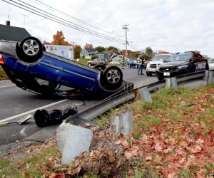 A Subaru rests on its roof after a single-vehicle accident at the intersection of Main Street and School Street in Damariscotta on Thursday, Oct. 13. (J.W. Oliver photo)