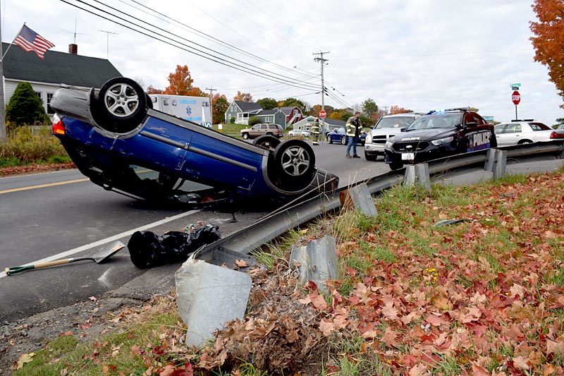 A Subaru rests on its roof after a single-vehicle accident at the intersection of Main Street and School Street in Damariscotta on Thursday, Oct. 13. (J.W. Oliver photo)