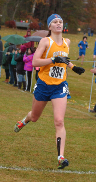 Boothbay Regions Faith Blethen crosses the finish line to win the South Class C Regional girls championship.  (Carrie Reynolds photo)