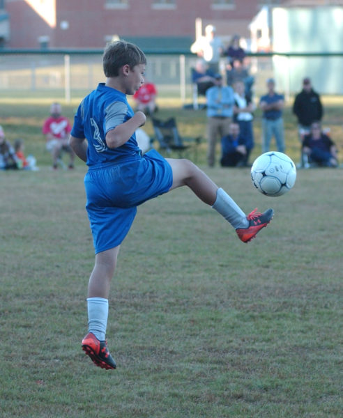 Gavin Kirkland boots the ball up the field for Jefferson. (Carrie Reynolds photo)