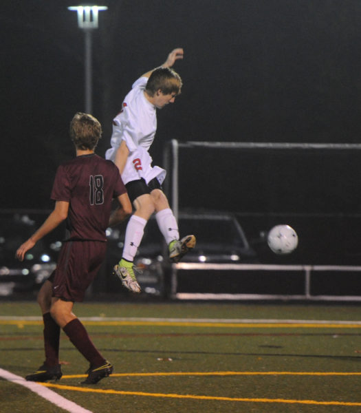 Natthan Simmons puts a shot on goal for the Eagles.