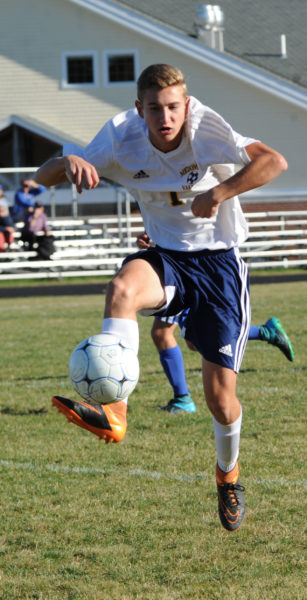 Joey Horovitz soars throught the air to trap the ball for the Panthers.  (Paula Roberts photo)