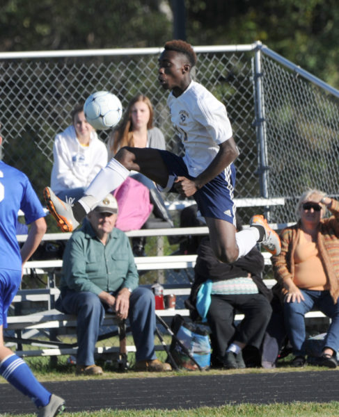 Zidane McMurrin leaps into the air to stop the ball in the Panthers 2-0 win over Morse.  (Paula Roberts photo)