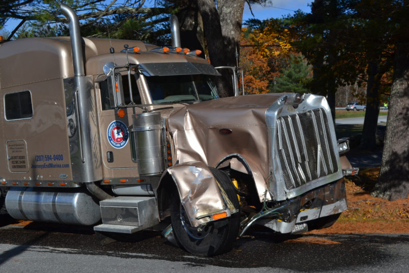 A tractor-trailer was involved in a fatal crash with a second truck on Route 1 in Damariscotta, near the intersection with Main Street, the morning of Monday, Nov. 7. The logo on the truck identifies it as being from Journey's End Marina in Rockland. (Maia Zewert photo)