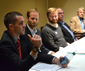 From left: Finn Melanson, a volunteer with the League of Women Voters, talks about Question 5 during a forum at Skidompha Library on Thursday, Nov. 3, while fellow panelists Garrett Martin, Will Ikard, Greg Dugal, and Marcus Hutchins look on. Lincoln Academy students hosted the forum about Questions 2, 4, and 5. (Maia Zewert photo)