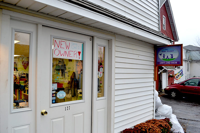 A sign on the door of The Kidz Closet, at 127 Elm St. in Damariscotta, announces the business's reopening under new management Thursday, Dec. 1. (Maia Zewert photo)