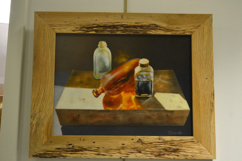 "What's in the Box?" is a meticulously created oil painting by Liliana Thelander, one of a number of her paintings on display in The Carey Gallery at Skidompha Public Library through Saturday, Dec. 31. (Christine LaPado-Breglia photo)