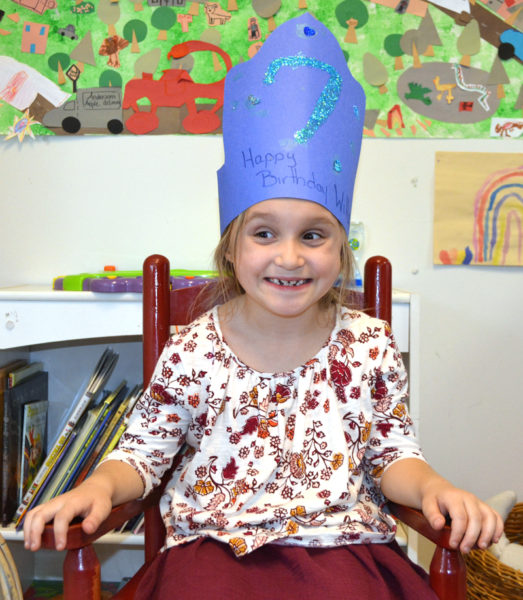 Willow Shadis, of Damariscotta, wears a crown celebrating her 7th birthday at Coastal Kids Preschool in Damariscotta. (Maia Zewert photo)