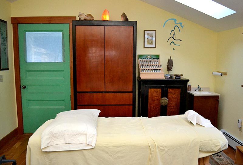 In addition to offering acupressure, Ching Liu, owner of The Golden Needle Wellness, teaches patients self-care techniques at his Chinese medicine practice in Newcastle. (Maia Zewert photo)