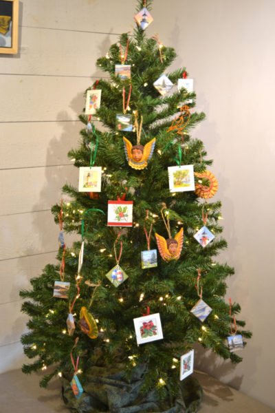 Miniature canvas paintings by Will Kefauver, Marnie Sinclair, Jan Kilburn, and Kathleen Horst decorate the Christmas tree at the Kefauver Studio & Gallery. (Christine LaPado-Breglia photo)
