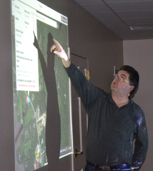 Bristol firefighter Daniel MacWalters explains how I Am Responding can map the fastest route to an emergency scene during a presentation to Newcastle firefighters Tuesday, Dec. 13. (Maia Zewert photo)