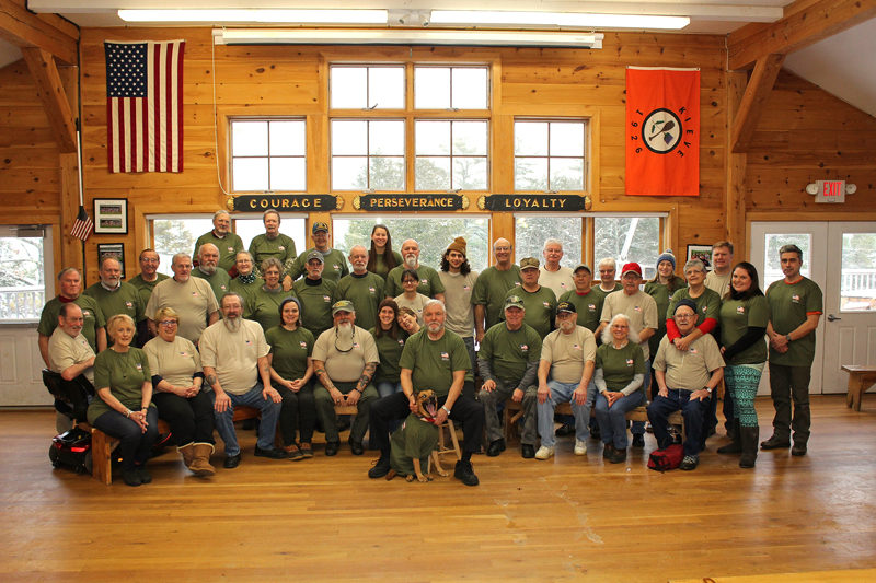 A group photo of the Vietnam War veterans who attended a week-long camp at Camp Kieve in Nobleboro Dec. 5-9, with guests and volunteers. (Photo courtesy Russ Williams)