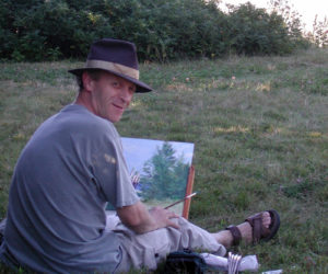 Douglas Smith paints on Marsh Island.