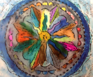 This colorful piece of artwork featuring a mandala was created by a participant in Mobius Inc.'s Creative Expressions program, which provides opportunities for people with developmental disabilities to explore a wide range of art mediums and crafts.