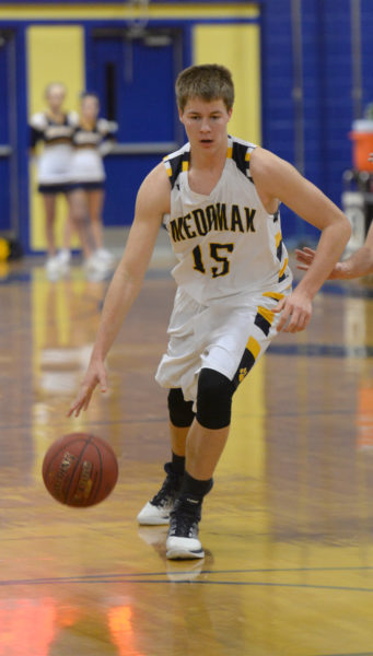 Kyle Donlin brings teh ball up the court for the Panthers. (Paula Roberts photo)