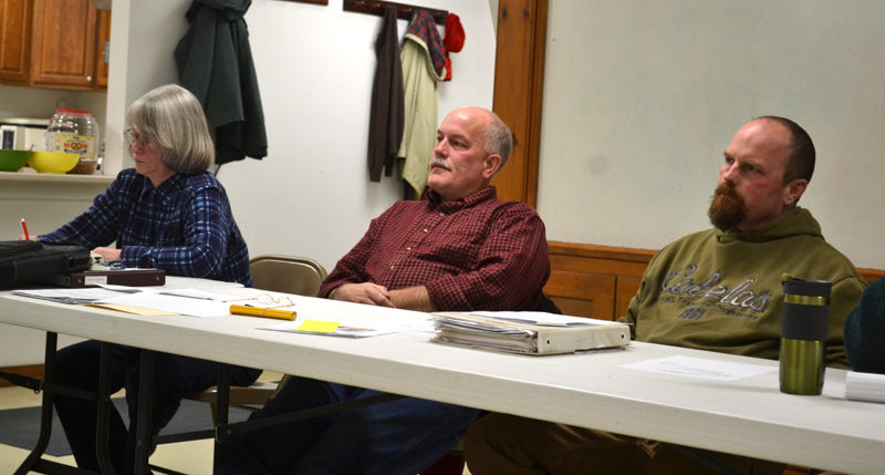 From left: Alna Planning Board members Beth Whitney, Peter Tischbein, and Sean Day listen to feedback about the board's draft fireworks ordinance during a public hearing on Monday, Jan. 9. (Abigail Adams photo)