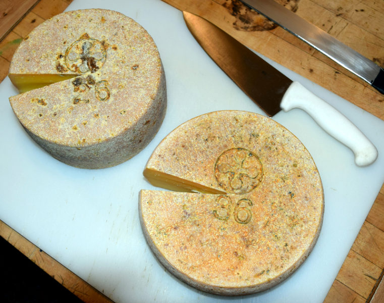 The Creamery at Bristolhof makes two varieties of cheese. Each wheel is numbered and stamped with the creamery's logo. (J.W. Oliver photo)