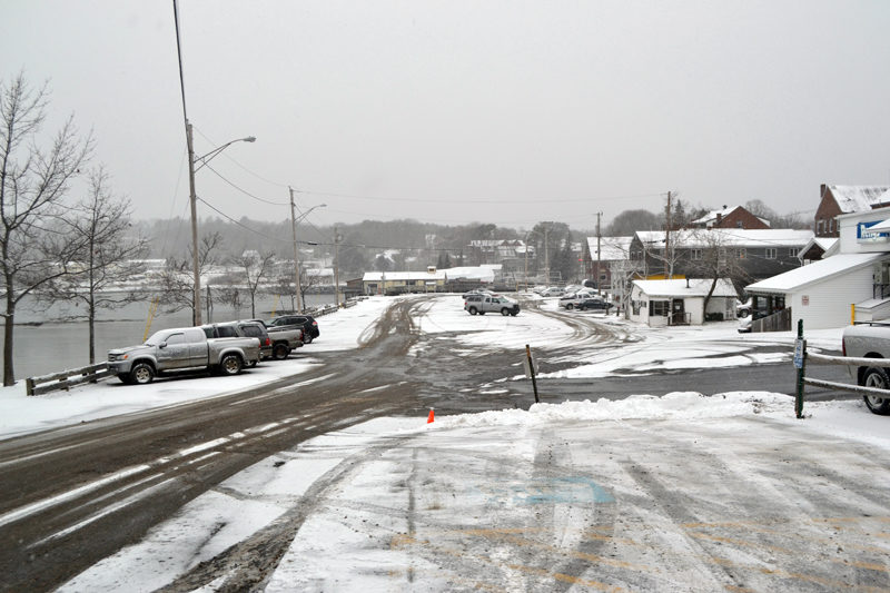 In an effort to complete improvements to the municipal parking lot, including the reconstruction of the lot and the stormwater system, Damariscotta town officials are discussing breaking the project into three phases over five years. (Maia Zewert photo)