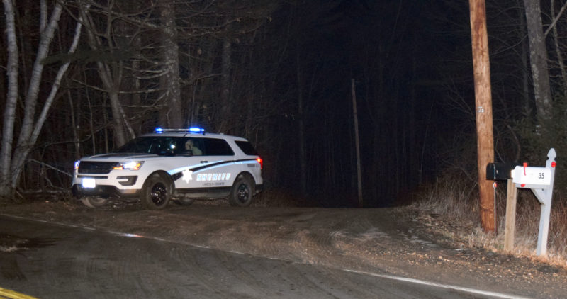 A Lincoln County Sheriff's Office vehicle waits at the end of River Bend Road in Waldoboro shortly after 2 a.m., Sunday, Jan. 22. Deputies closed the gravel road off Winslows Mills Road after a police-involved shooting early Sunday. (J.W. Oliver photo)